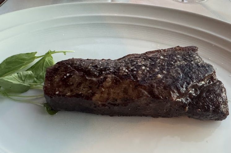 The Eiffel Tower Restaurant signature dishes Slow Braised Short Rib
Prime Aged New York Steak
Mediterranean Sea Bass